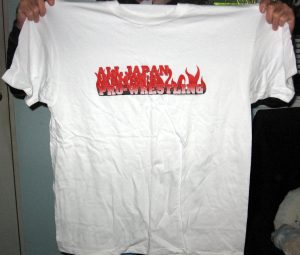 white t shirt with red writing