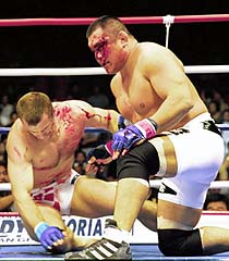 Fujita bleeding on Crocop from Nikkan Sports